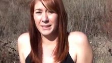 Thick redhead sucking cock outdoors